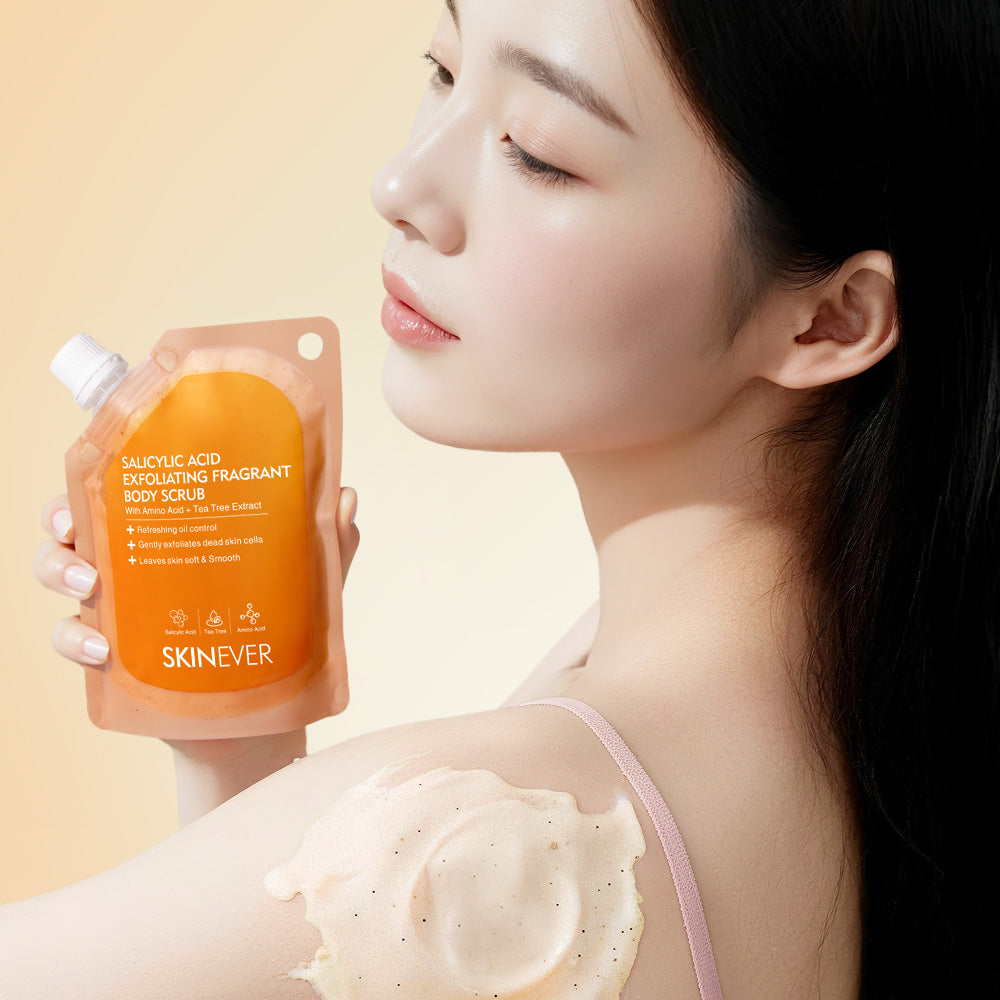 Woman applying SKINEVER body scrub with a beige background