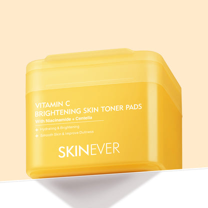 Yellow container of Skinever Vitamin C Brightening Skin Toner Pads on a beige background