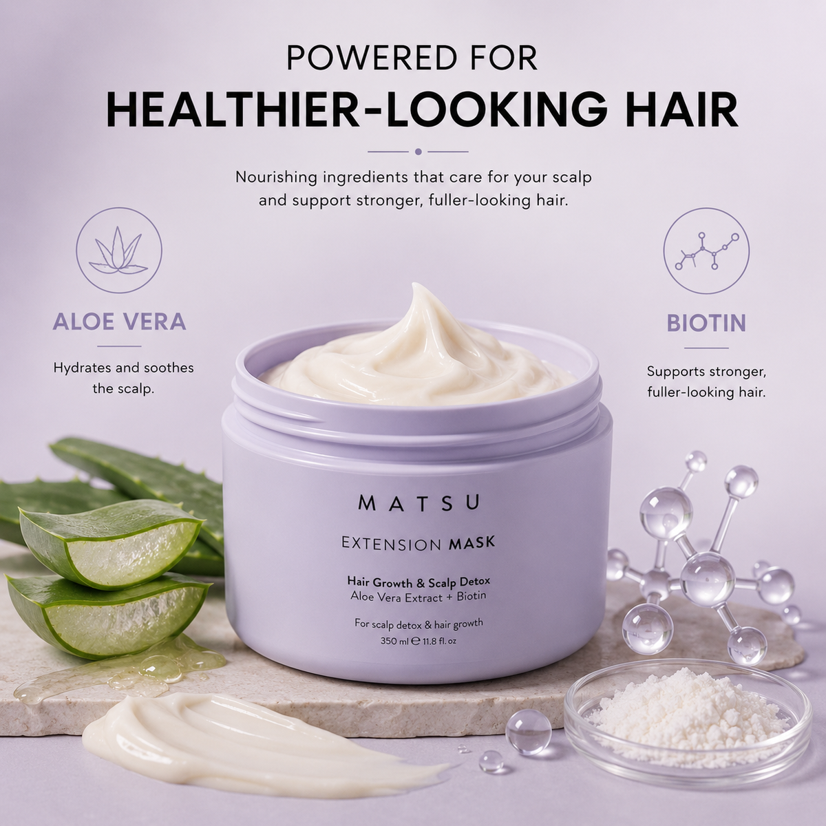A jar of MATSU Extension Mask with cream-colored product shown on a light lavender background with text and ingredient callouts for aloe vera and biotin, plus sliced aloe leaves and clear decorative spheres.